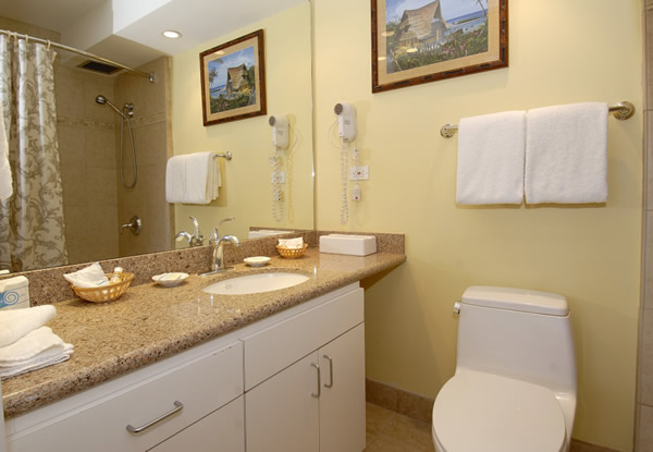 The toilet paper holder mounted inside the cabinet door under the sink. -  Picture of Mana Kai Maui - Tripadvisor